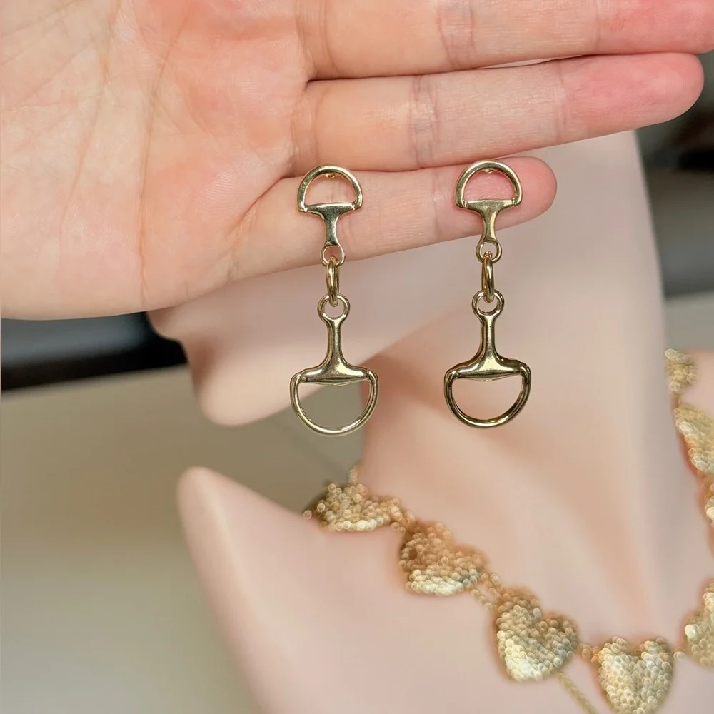 Anthropologie elegant gold